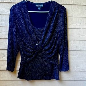 Beautiful ionic blue and black blouse, in a great condition.
